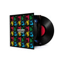 A vinyl record and its cover featuring 'David Bowie' with multicolored face graphics over a black background. The album is titled 'At The Kit Kat Klub (Live New York 99)'.